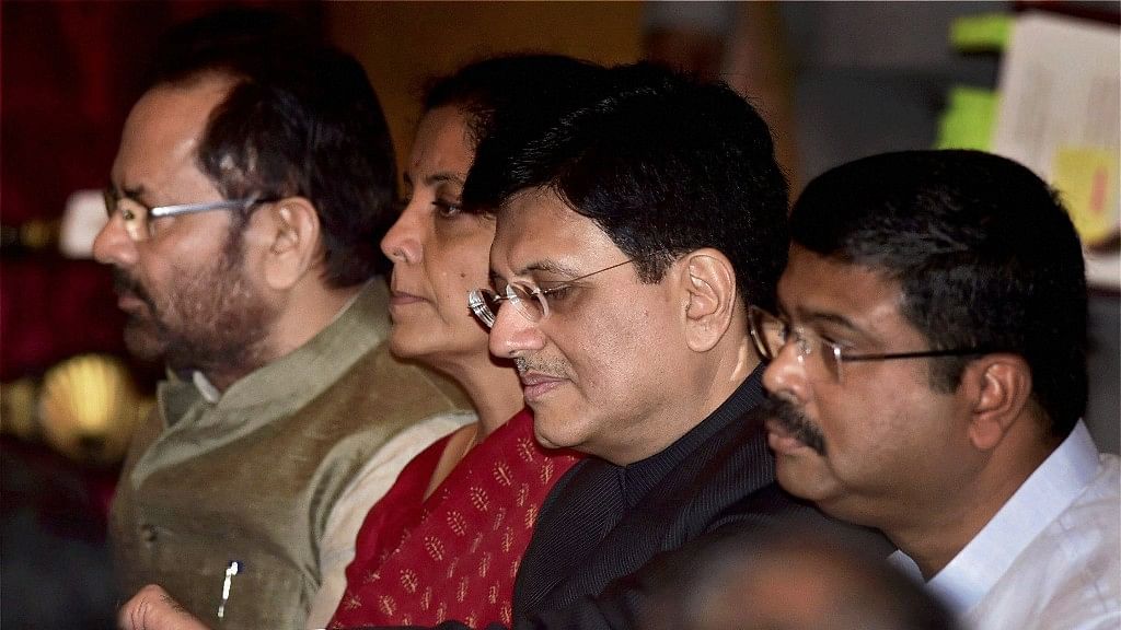 Cabinet Minister Piyush Goyal  with cabinet colleagues Nirmala Sitharaman, Mukhtar Abbas Naqvi and Dharmendra Pradhan for the swearing in ceremony at Rashtrapati Bhavan in New Delhi on Sunday.