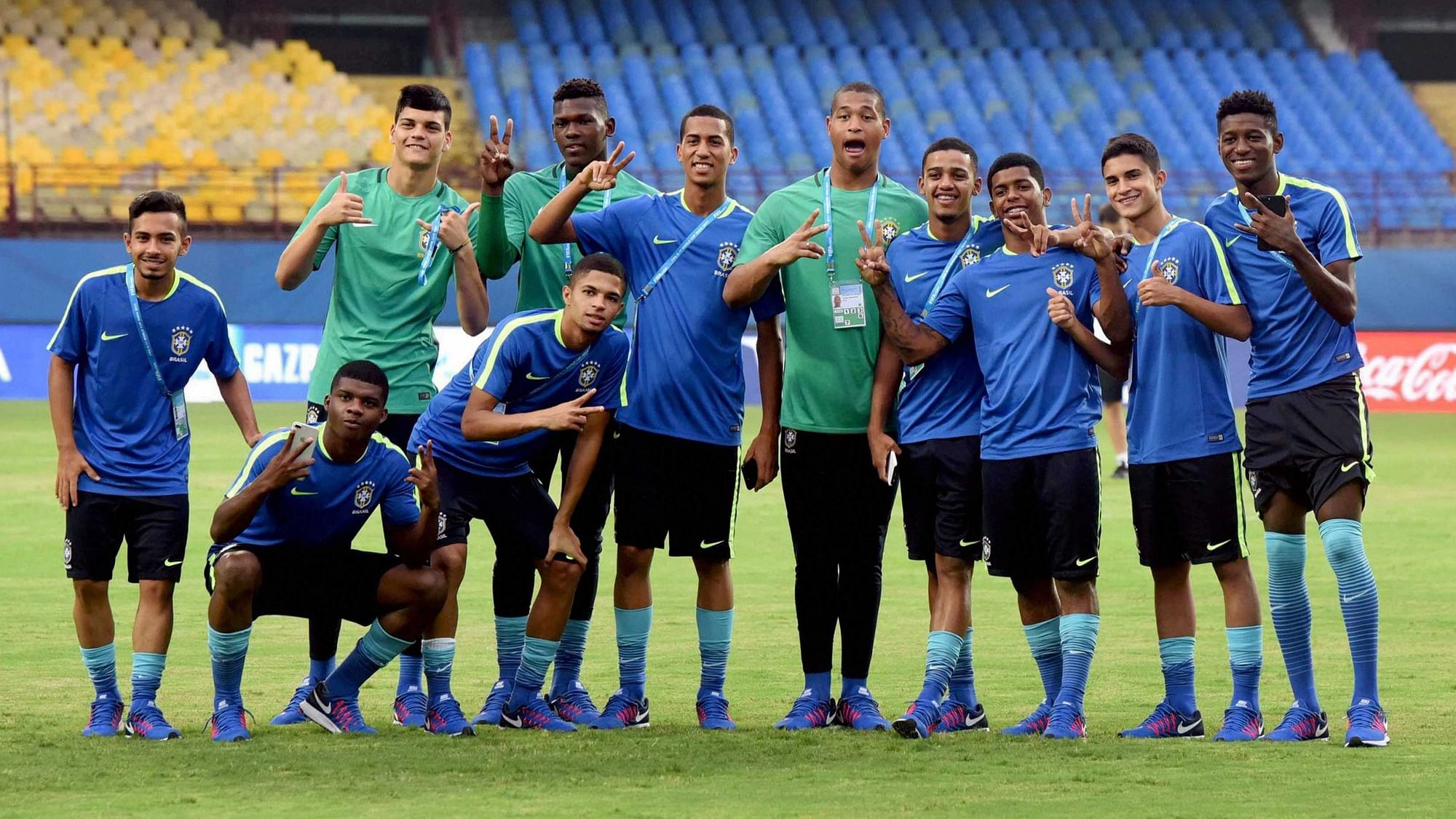 Kochi : FIFA U-17 World Cup football players of the Brazil team posing for photographs after visiting the Jawaharlal Nehru International Stadium in Kochi on Thursday.&nbsp;