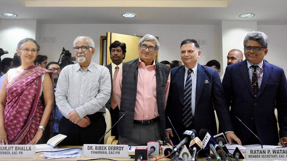 Bibek Debroy, Chairman, Economic Advisory Council to the Prime Minister (EAC-PM) with members Ratan P Watal, Rathin Roy, Surjit Bhalla and Ashima Goyal during a press conference in New Delhi on Wednesday.