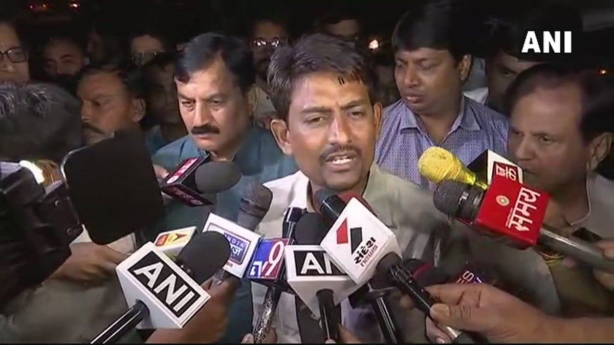 Alpesh Thakor talks to the media following his decision to join Congress.