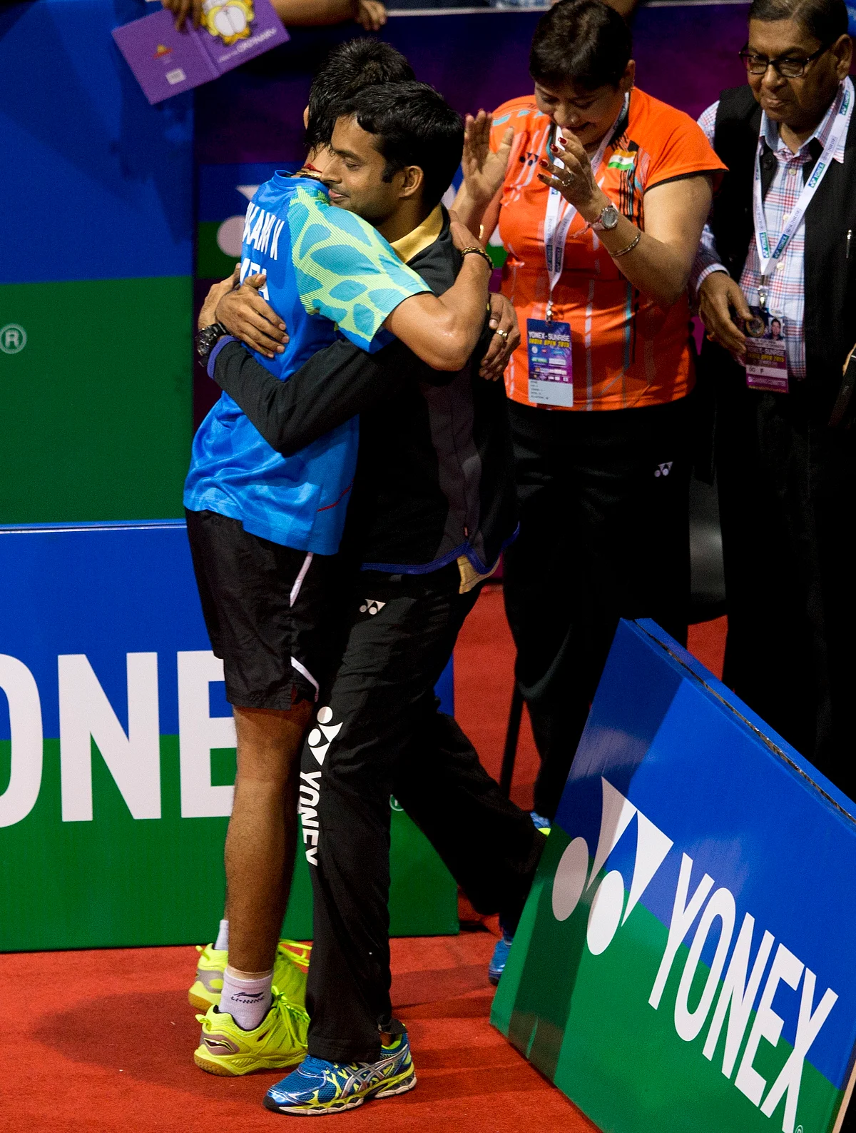 India’s K. Srikanth hugs coach Pullela Gopichand after winning the India Open Badminton in March, 2015