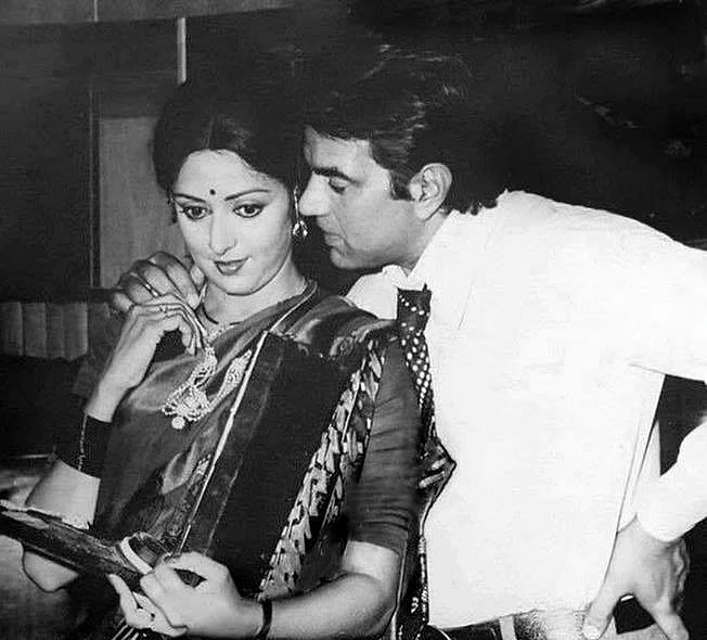 Hema Malini and Dharmendra on the sets of a film.