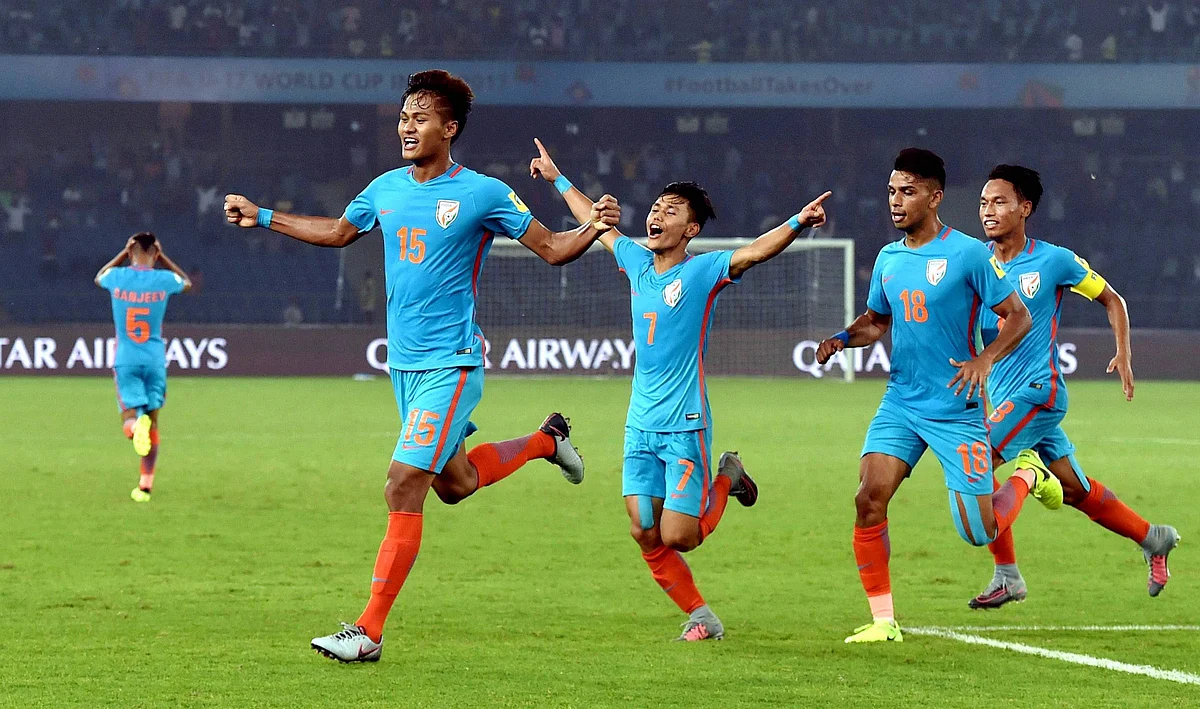 Jeakson Singh celebrates India’s first-ever FIFA World Cup goal with his teammates.