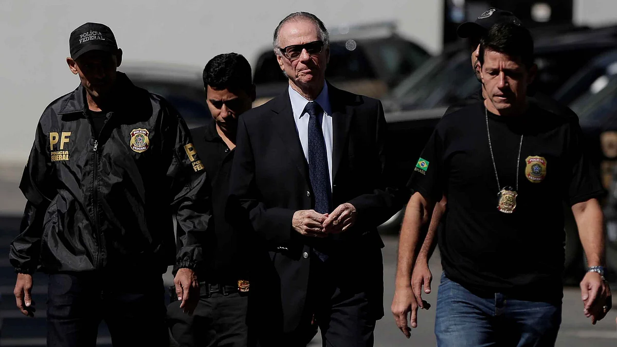 Carlos Arthur Nuzman arrives at Federal Police headquarters in Rio de Janeiro on Thursday.
