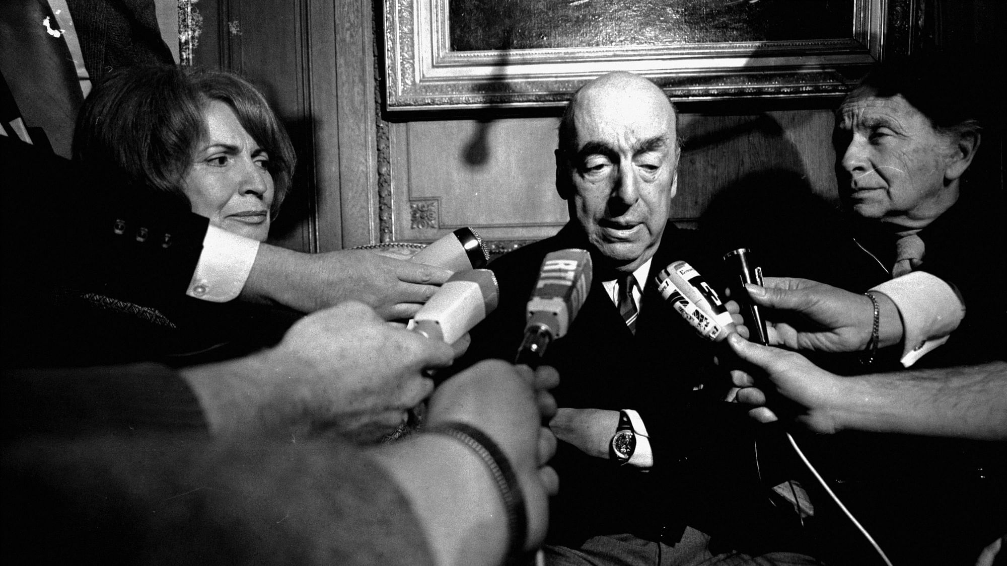 File photo of Pablo Neruda talking with reporters after being named the 1971 Nobel Prize winner for Literature