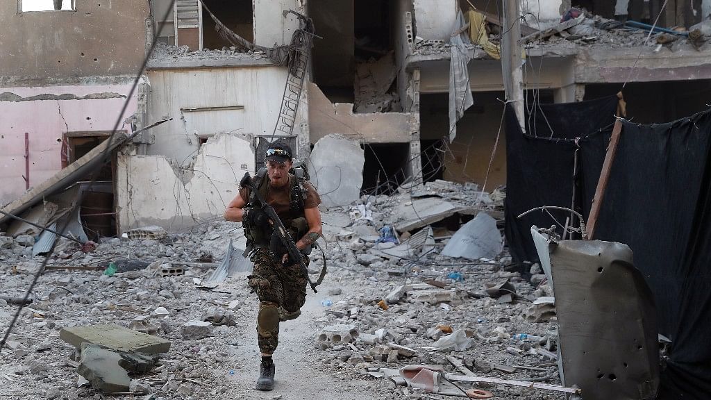 File photo of a US-backed Syrian Democratic Forces fighter in Raqqa, Syria. <i>(Photo: AP)</i>
