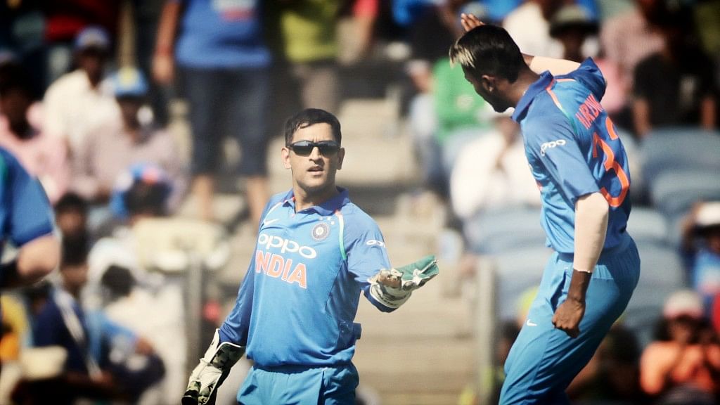 Hardik Pandya and MS Dhoni celebrate a wicket during the second ODI against New Zealand in Pune.