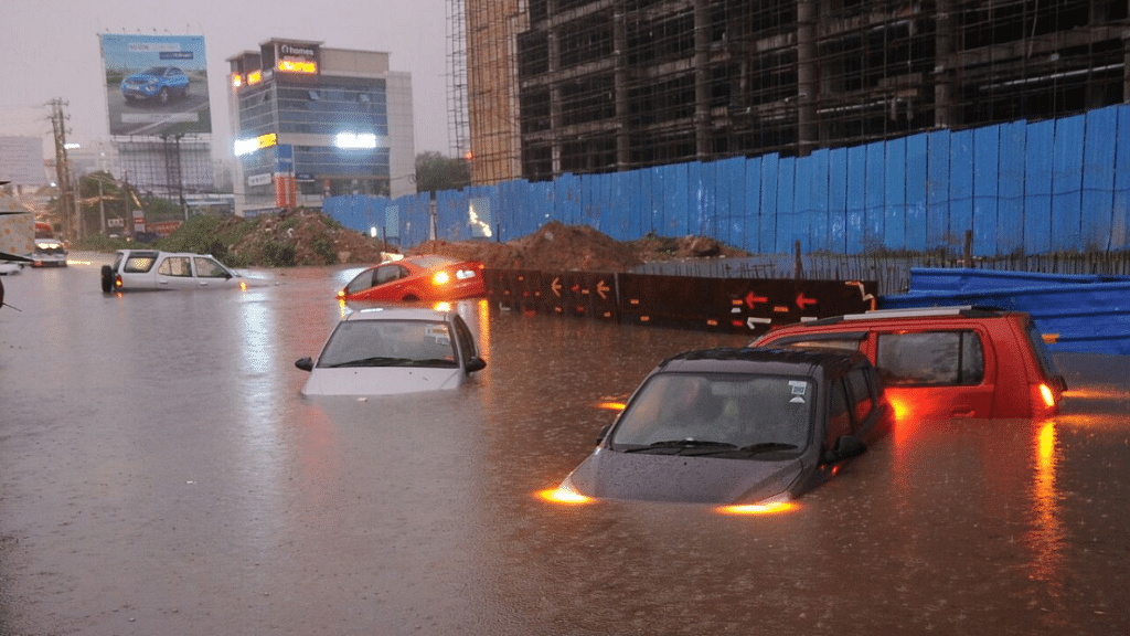 Cars submerged in water in the Hyderabad floods.