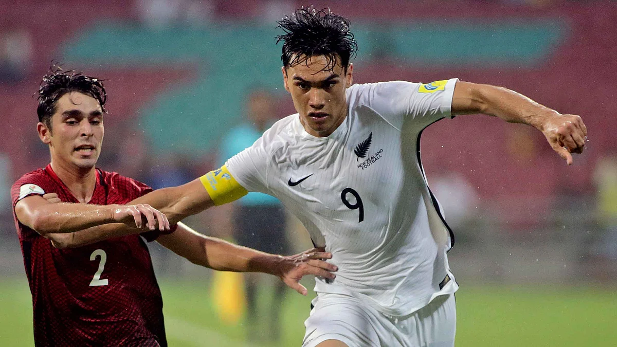 New Zealand’s Max Mata fights for the ball with Turkey’s Emirhan Civelek.