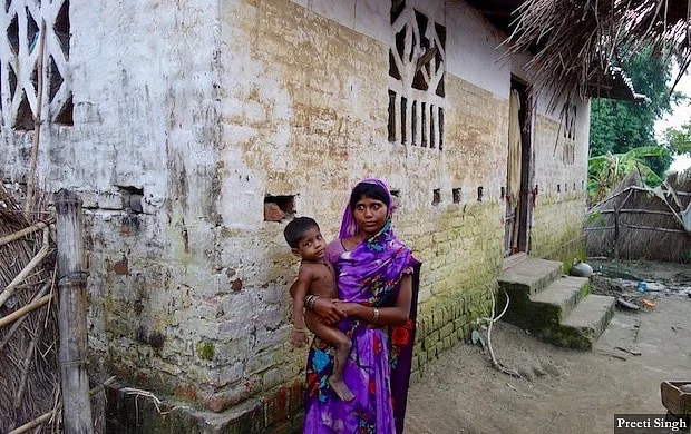 Chanda Devi of Marjadi was caught in the rising flood water along with her two young children. They were rescued by fellow villagers as water level crossed 6-feet (mark on the wall of the house) in the village.