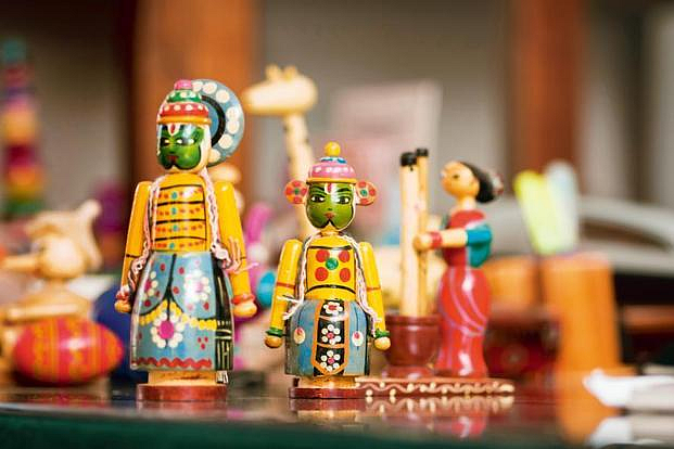 A colorful set of handmade Channapatna toys at display.
