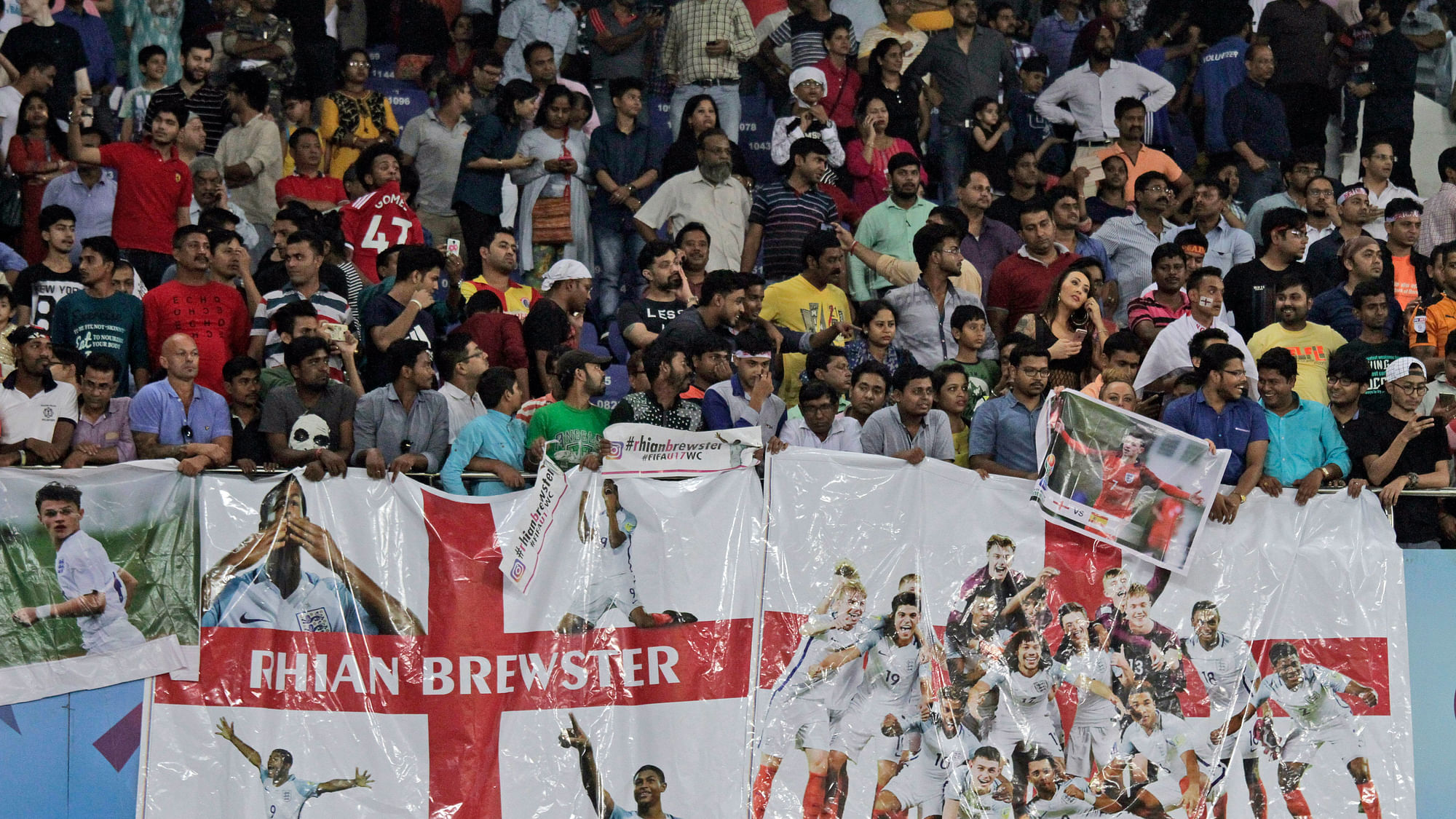 A group of fans at the Salt Lake Stadium in Kolkata during the FIFA U-17 World Cup final.