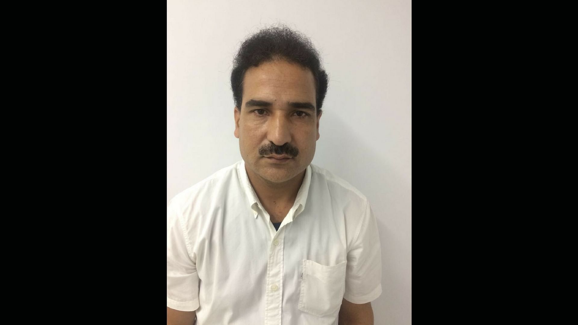 Syed Shahid Yousuf post-arrest by NIA.