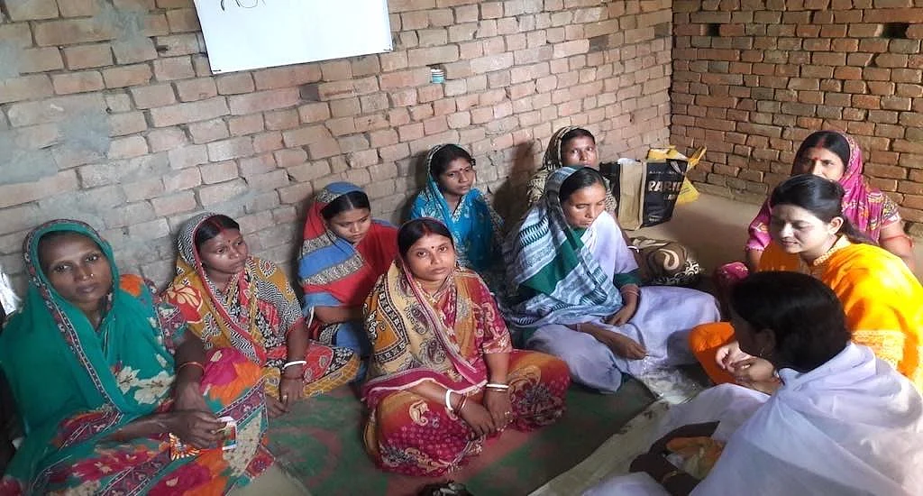 Women of Ilami panchayat learn about health, hygiene and pregnancy care at the night school. 
