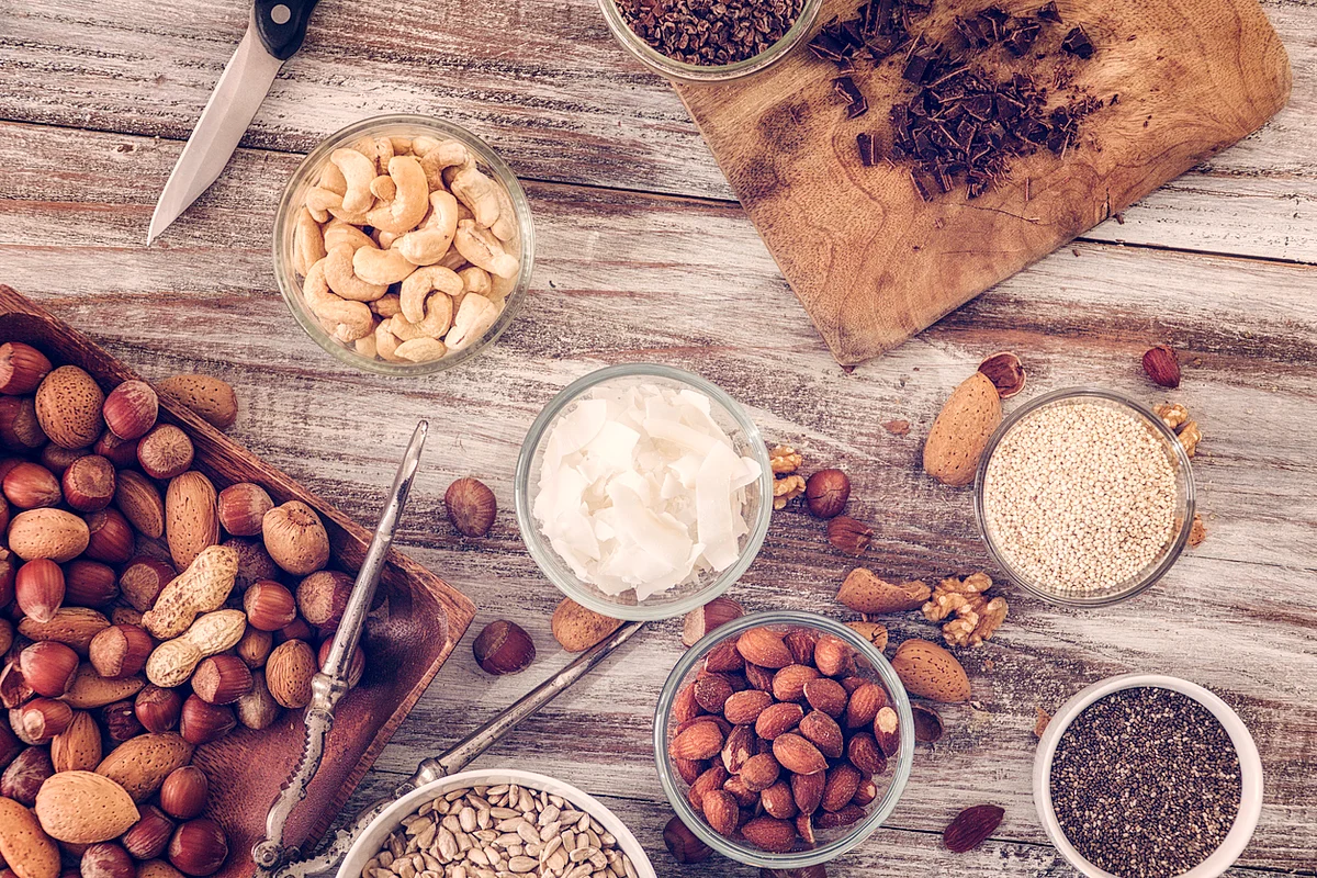 Superfoods (seeds and nuts) on a platter. 