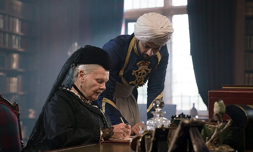 Judi Dench and Ali Fazal in a scene from <i>Victoria & Abdul. </i>