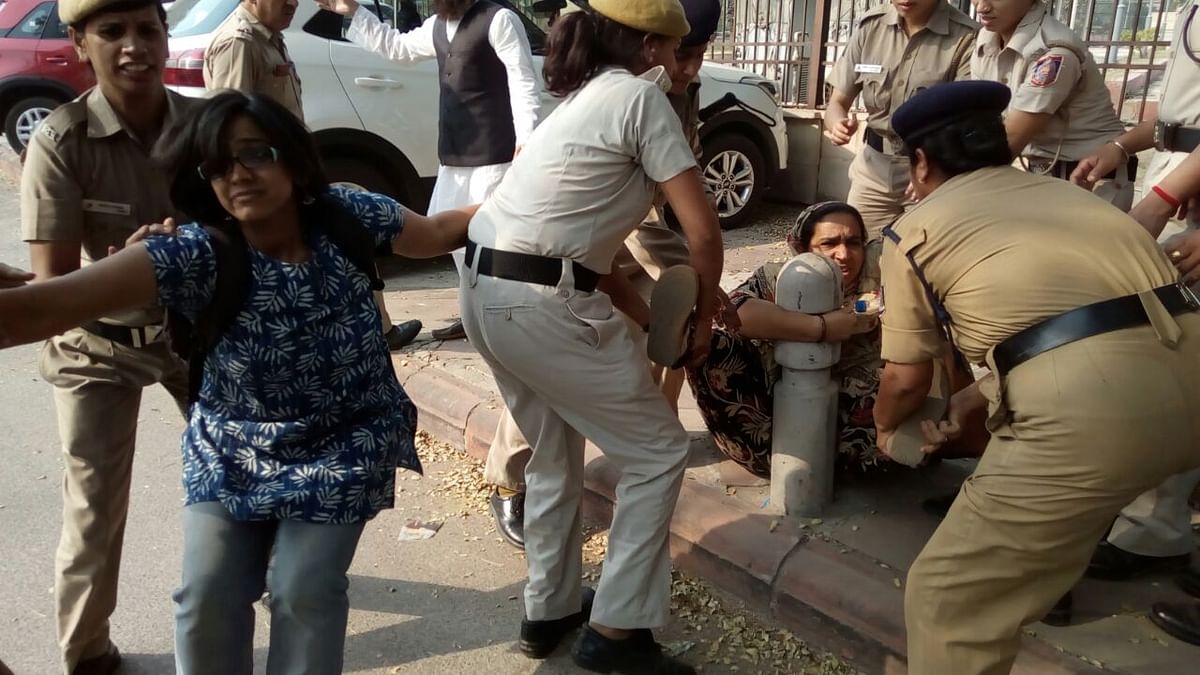 Najeeb’s mother being dragged outside the Delhi High Court on Monday, 16 October.