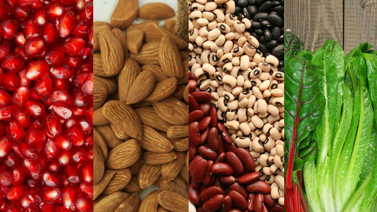 Iron rich foods (Left to Right) Pomegranate, Almonds, Legumes and Leafy Greens. 