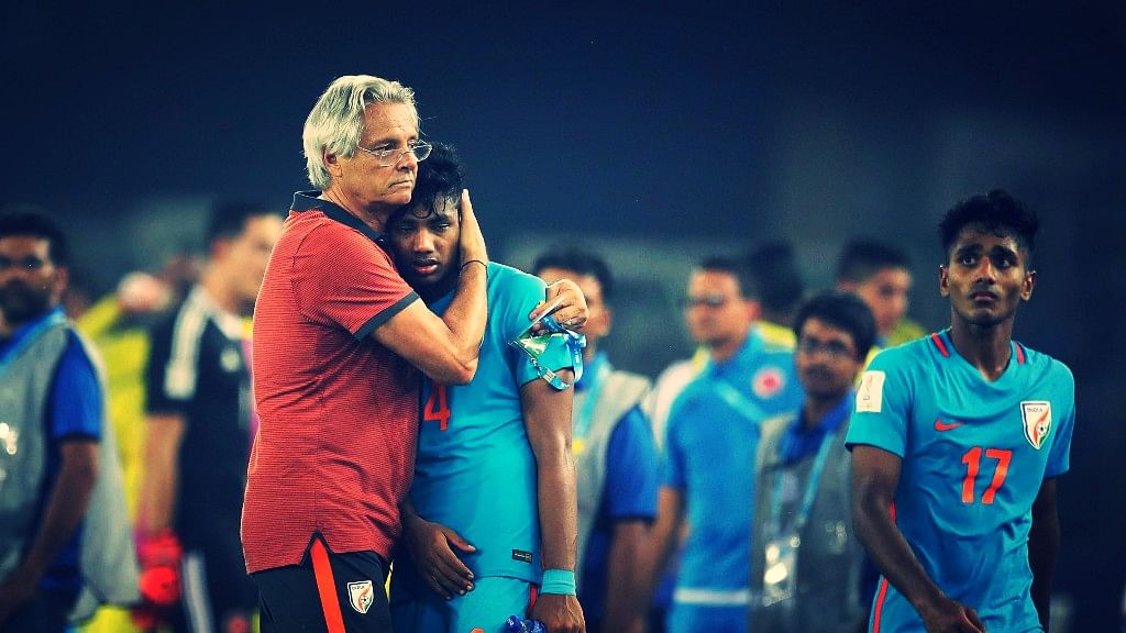 India’s Head Coach Luis Norton de Matos hugs Rahim Ali after losing their match against Colombia during the FIFA U-17 World Cup in New Delhi