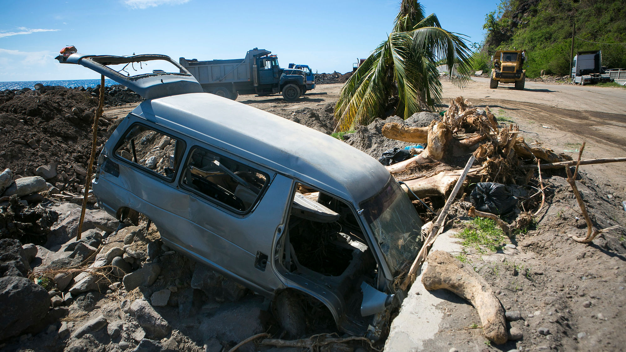 This Monday, 9 October 2017 photo shows a destroyed vehicle in the village of Coulibistrie, Dominica after water and debris came rushing down the hill.&nbsp;