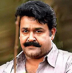 Malayalam superstar Mohanlal. (GIF Courtesy: <a href="https://media.tenor.com/images/dda65af80e67391bed9f1903bbc0586c/tenor.gif">Media.tenor.com</a>)
