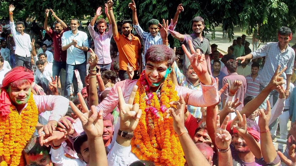 

Newly elected Allahabad University Students Union President Avanish Kumar Yadav center along with suppoters celebrate after Samajwadi Chhatra Sabha won four out of the five posts in Allahabad on Sunday.&nbsp;