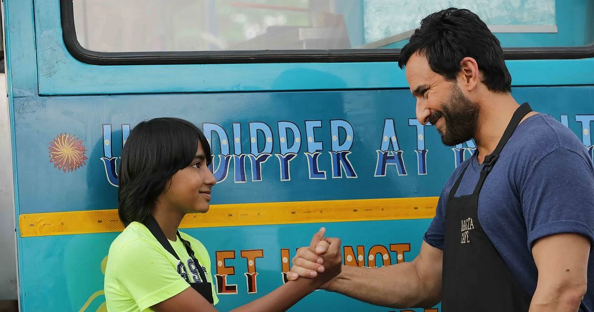 Svar Kamble and Saif Ali Khan in a scene from <i>Chef. </i>