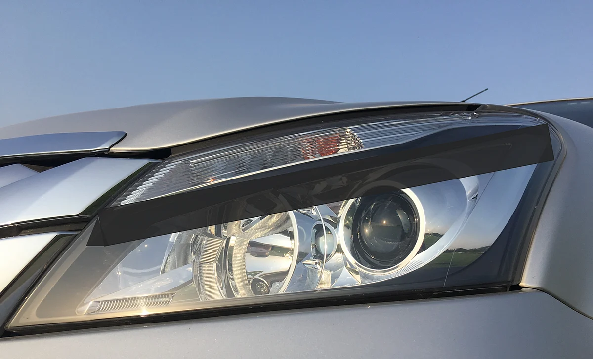 Karnataka had a rule where headlamps had to be painted half black. 