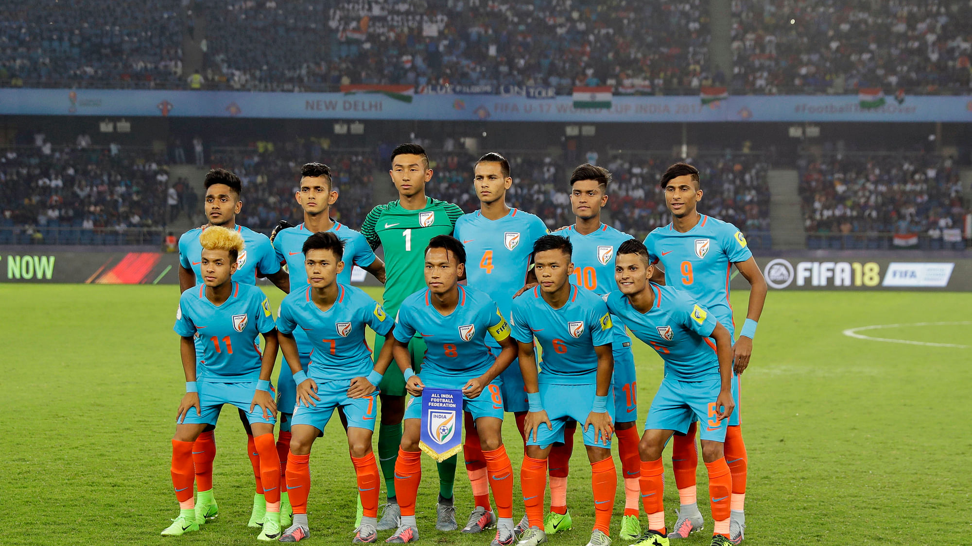 The Indian team pose for a team photo before the start of their Under-17 World Cup match against USA in New Delhi.