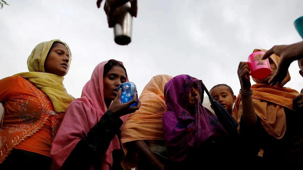 Rohingya refugees fleeing to Bangladesh.