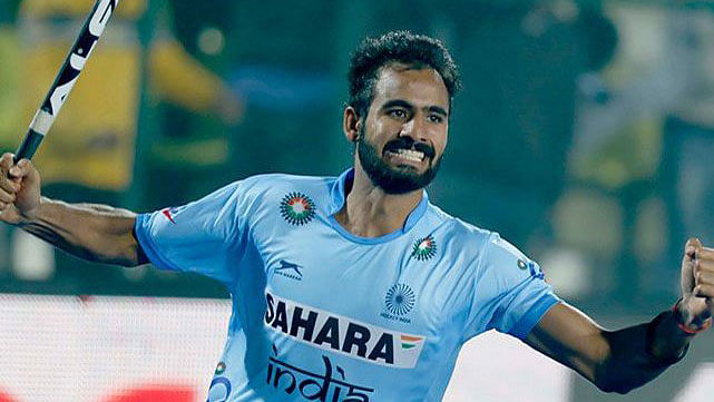 Gurjant Singh celebrates after scoring against South Korea.