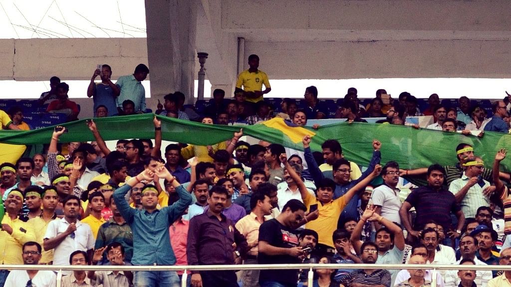Kolkata: Football fans cheer during the FIFA U17 World Cup 2017 Semi Final match between Brazil and England at Salt Lake stadium  in Kolkata, on Oct 25, 2017.&nbsp;