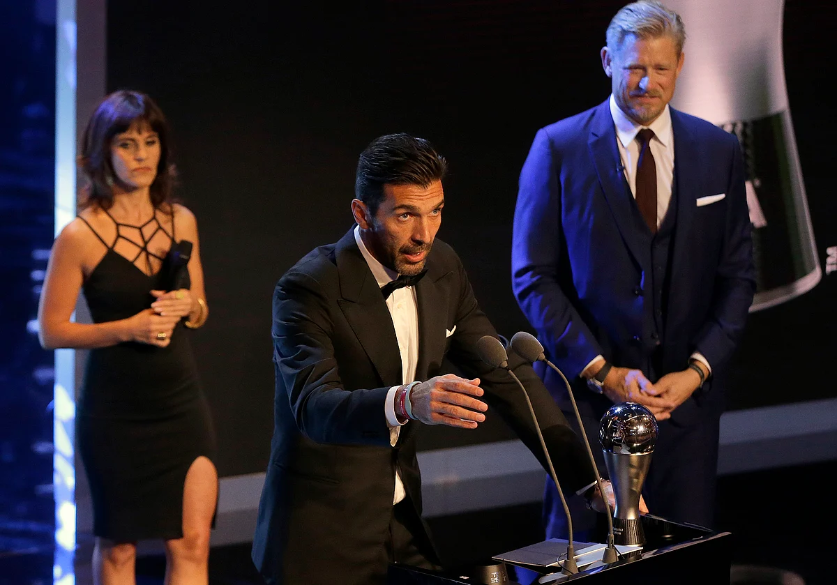 Italian soccer goalkeeper Gianluigi Buffon speaks as he receives the Best FIFA Goalkeeper award during the The Best FIFA 2017 Awards at the Palladium Theatre in London.