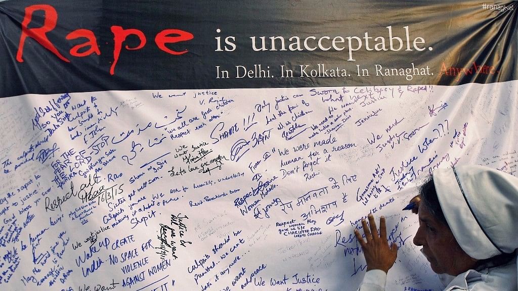 Signatures for anti-rape on a banner.&nbsp;