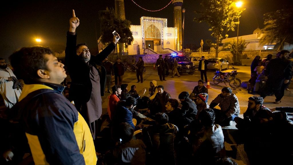 People condemn an attack on a Shiite mosque in Islamabad, Pakistan on Wednesday, 29 November.