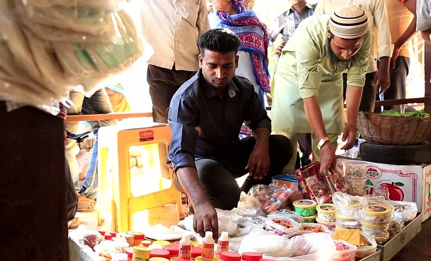 Ahmed Tamboli wraps up his spread after spotting a BMC official.