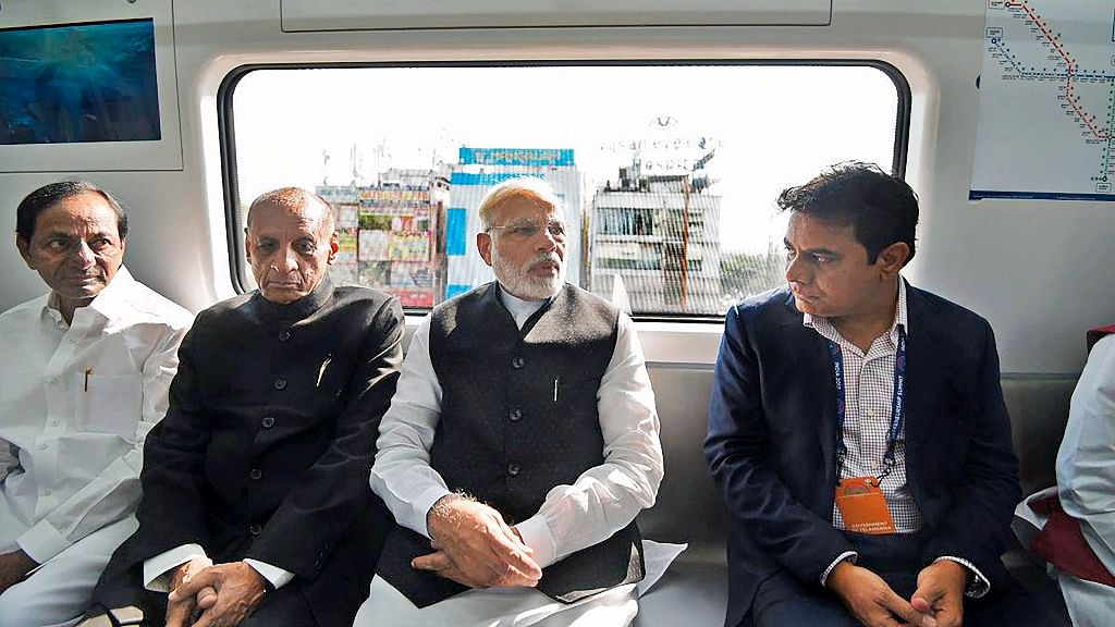 PM Narendra Modi, accompanied by Telangana Governor ESL Narsimhan and Chief Minister K Chandrasekar Rao, taking a ride in a metro train after launching the Hyderabad Metro Rail