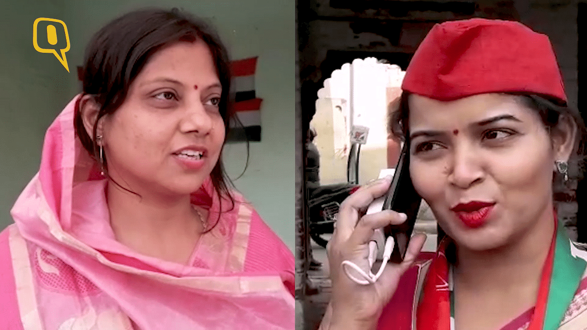 Sisters-in-law stand against each other in Varanasi.