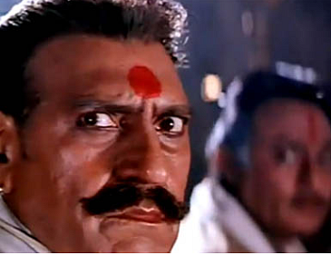 Amrish Puri as Thakur Darjan Singh in <i>Karan Arjun</i> (1995). 