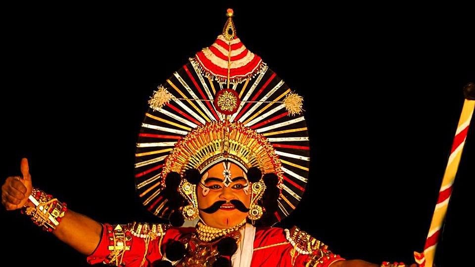 Traditional Yakshagana artists enacting a lively scene from Indian  mythology, their elaborate costumes adding authenticity to the performance.  Stock Photo | Adobe Stock