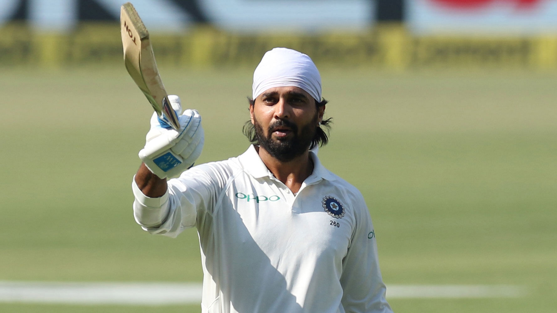 Murali Vijay raises his bat after scoring a century on Day 2 of the second Test against Sri Lanka in Nagpur on Saturday.