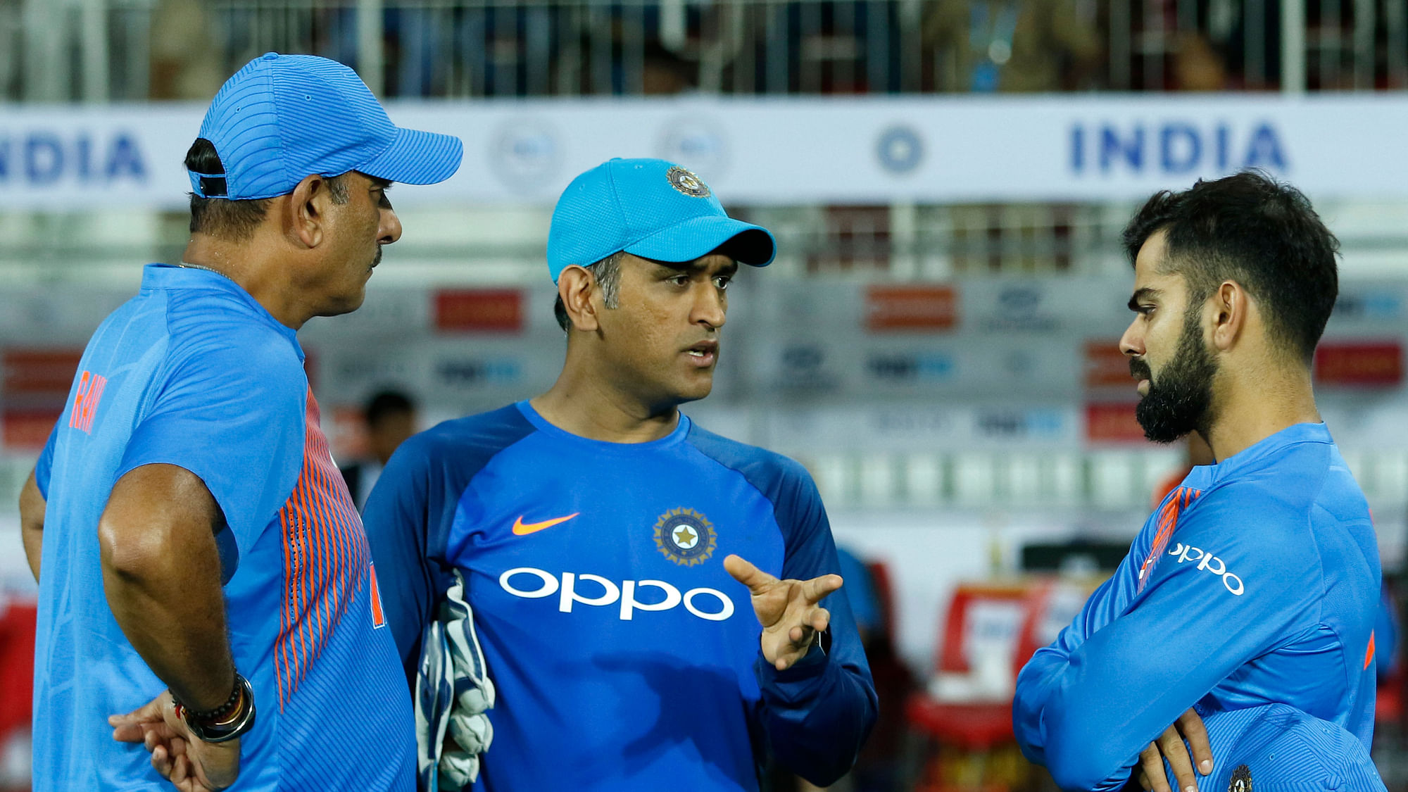 Ravi Shastri, Mahendra Singh Dhoni and Virat Kohli during India’s third T20 against New Zealand.&nbsp;