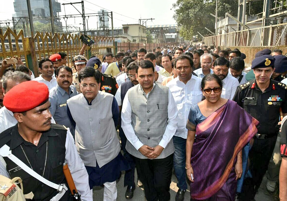 Defence Minister Nirmala Sitharaman (R), Maharashtra Chief Minister Devendra Fadnavis, and Union Railways Minister Piyush Goyal take stock of the ‘improvement works’ in progress after a stampede at Elphinstone Road in Mumbai.