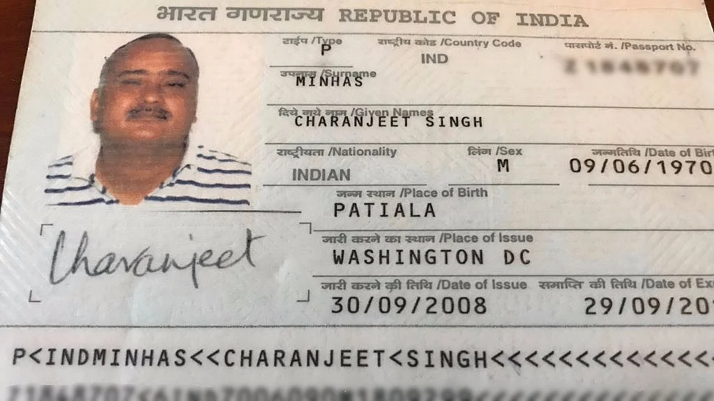 Charanjeet’s passport with a picture without beard and turban