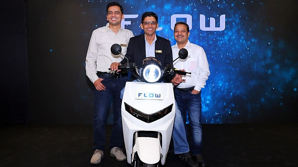 22 Motors’ co-founders, Vijay Chandrawat, Parveen Kharb and Farhan Kapadia with their electric scooter, Flow.