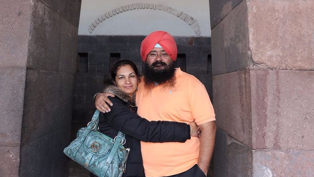 Charanjeet Minhas with his wife.&nbsp;