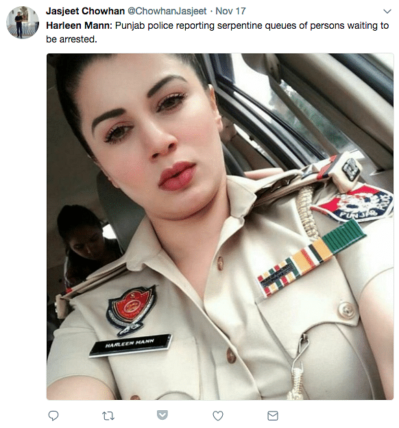 The photo of an officer named Harleen Mann is going viral on social media, with captions like “I surrender”. 