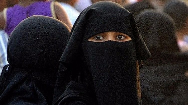 Representational image of a woman clad in a burqa.