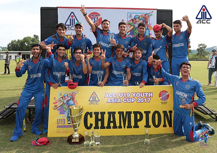 Afghanistan bowler Rashid Khan who got man of the series waving to his fans after winning T20 cricket match series between Bangladesh and Afghanistan in Dehradun on 7 June.