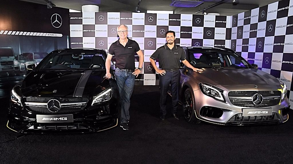 Mercedes-Benz India MD &amp; CEO Roland Folger (left) with the AMG CLA 45 and the AMG GLA 45 4Matic.